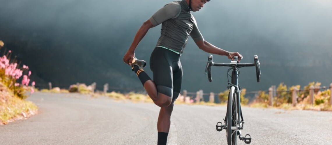 black-man-road-and-bicycle-stretching-fitness-or-2022-12-16-15-32-07-utc-1