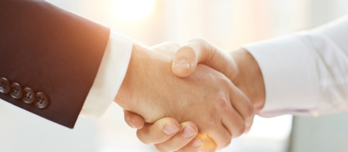 business-partners-shaking-hands-after-negotiation-2022-11-16-15-40-34-utc-1