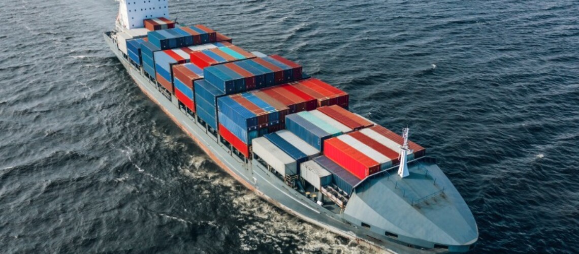 container-vessel-in-the-sea-2021-10-22-06-35-08-utc-1