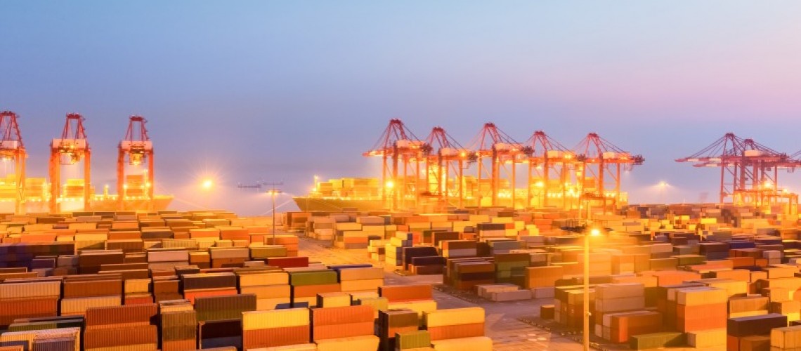 container-wharf-in-nightfall-international-import-2023-11-27-04-50-51-utc-1