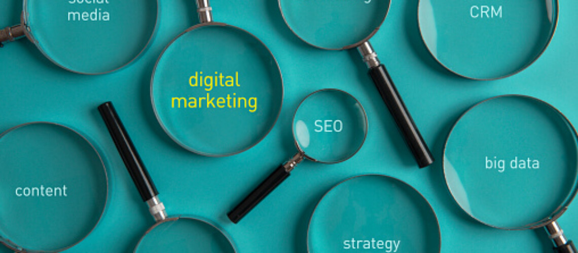 Magnifying glasses on the blue background. Digital marketing concept.