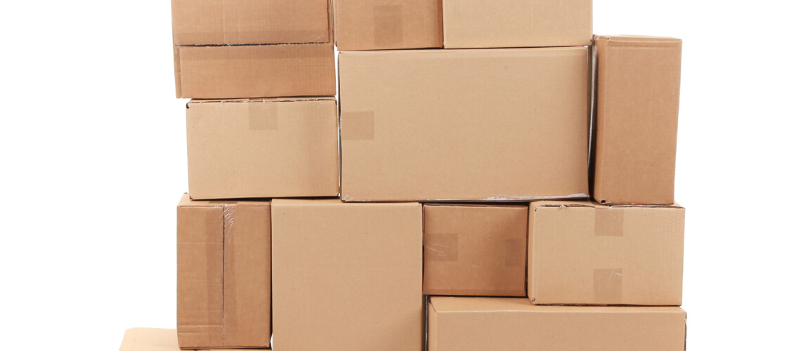 Stacks of cardboard boxes. Isolated on a white background.